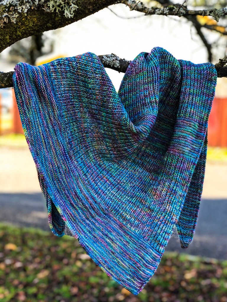 Downtime shawl hanging on a tree branch