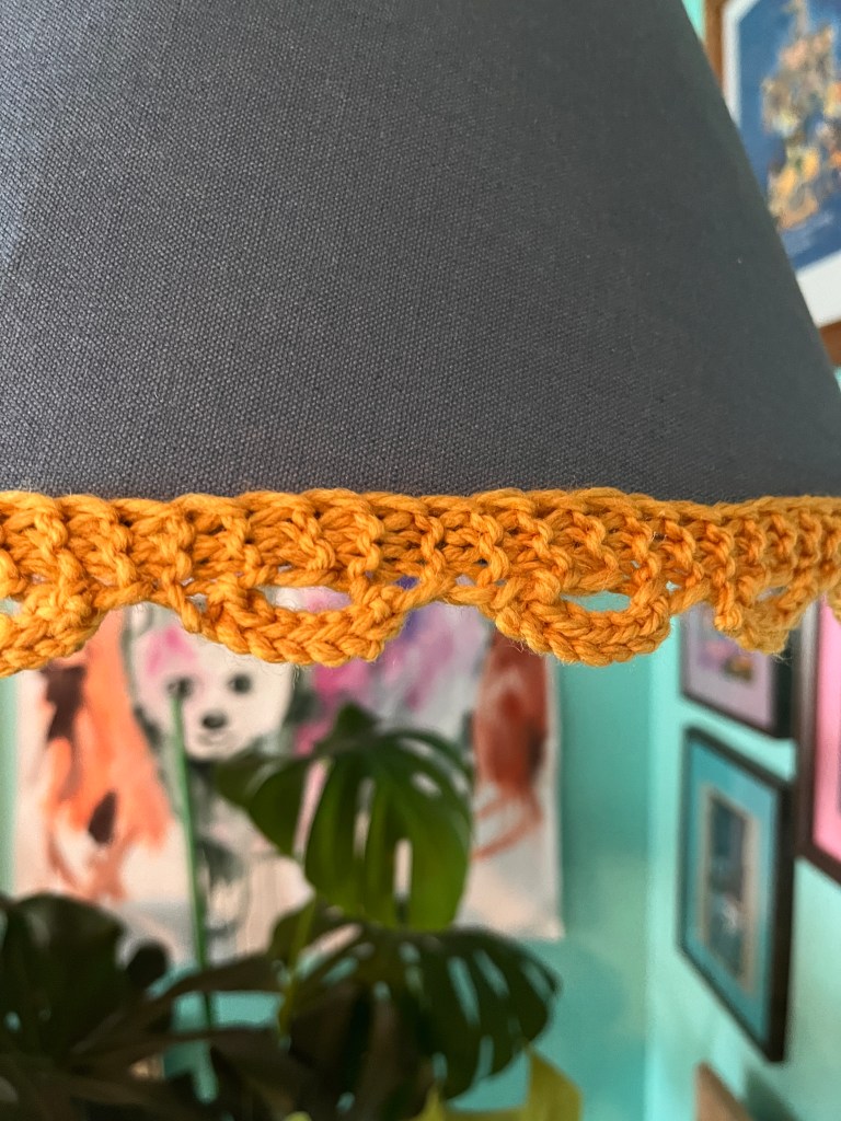 close up of knit lampshade trim
